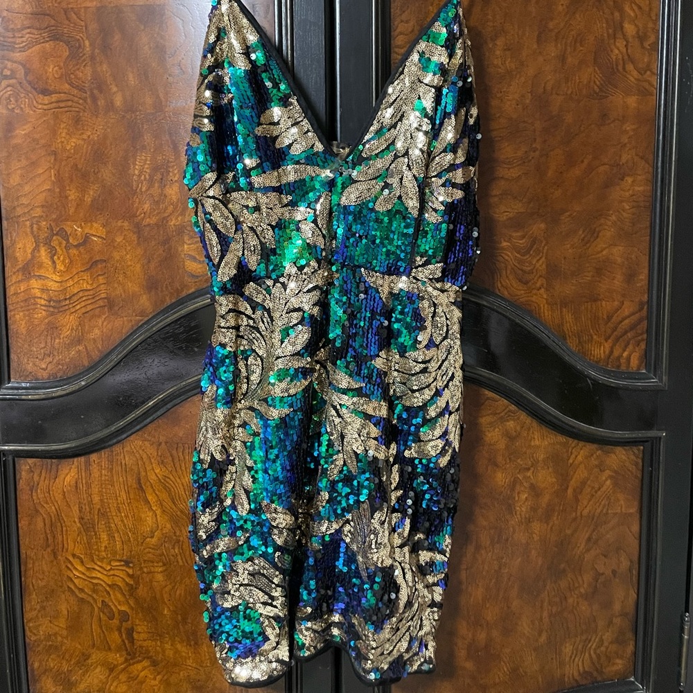 Sparkly short dress. Size medium. Like new, used once.